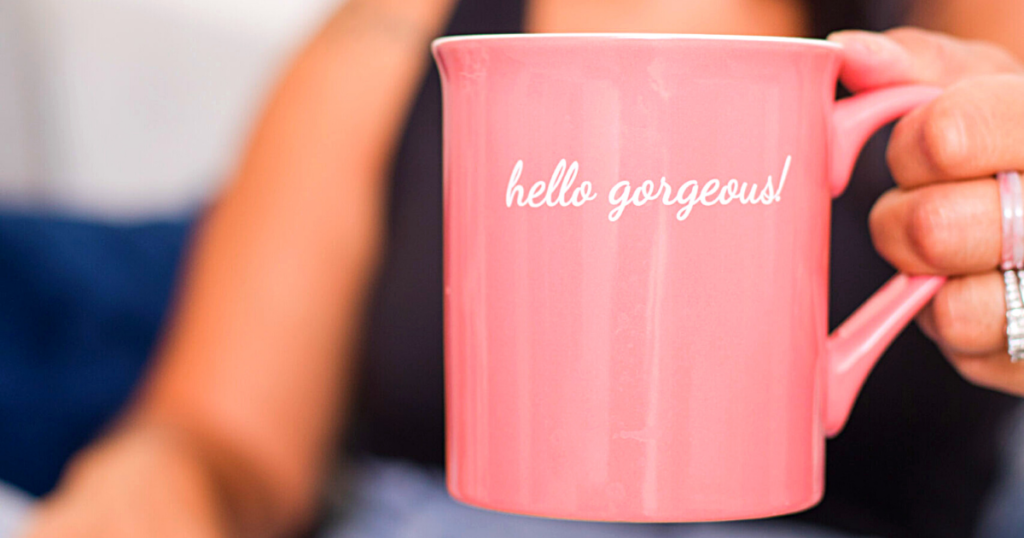 Pink mug that says "hello gorgeous"