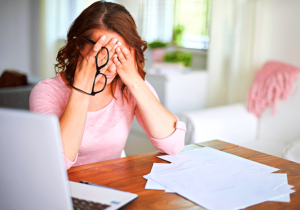 woman stressed at her horrible jobs