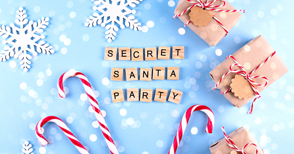 Candy canes and wrapped gifts with letters spelling secret santa party